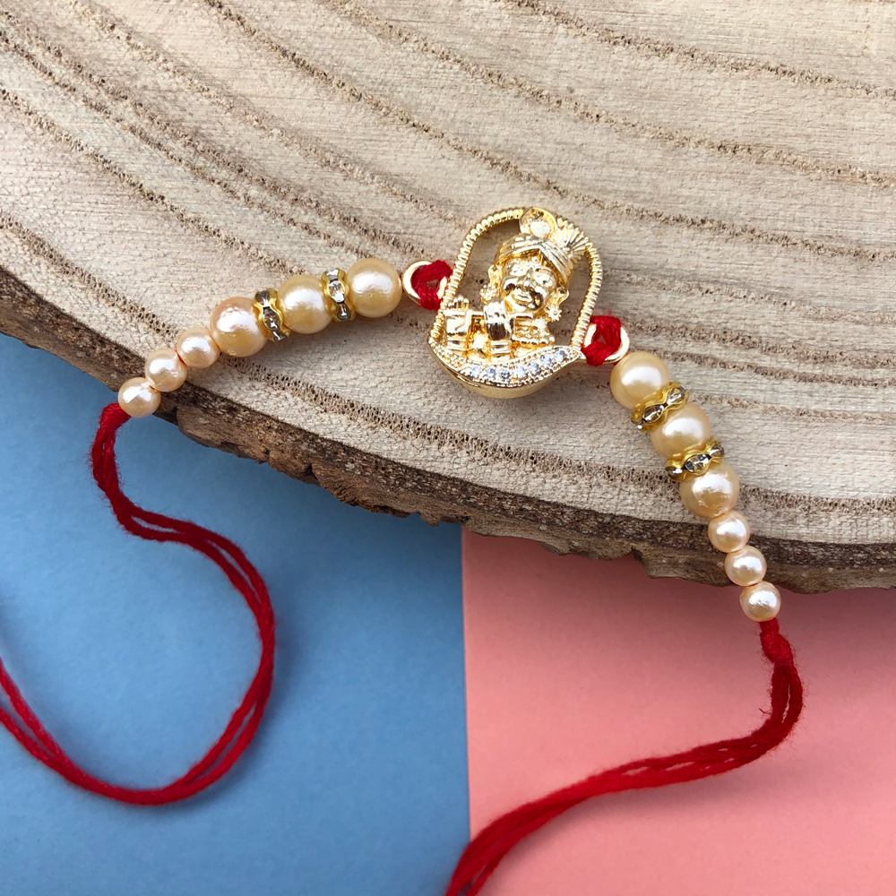 Krishna charm chain gemstone pearl handmade bracelet at ₹950 | Azilaa