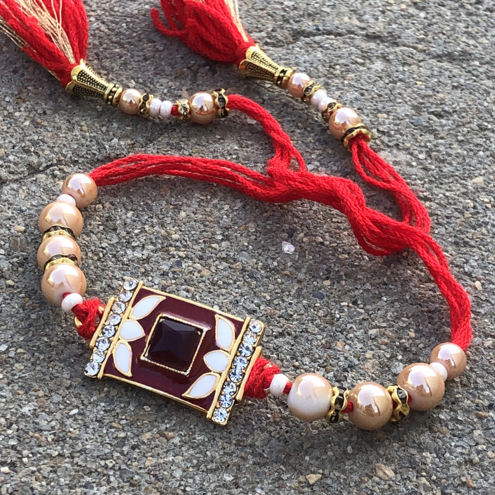 CZ Stone Rakhi with Peach Beads for Raksha Bandhan | Buy Online ...