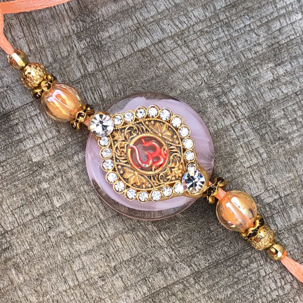 Exclusive OM Design Rakhi with Gold & Diamond Work | Buy Online ...