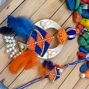 Wonderful Resham Work with Feather Design Bhaiya Bhabhi Rakhi Set