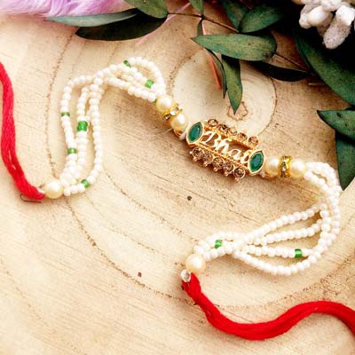 Beautiful Bhai symbol Thread Rakhi with small pearl