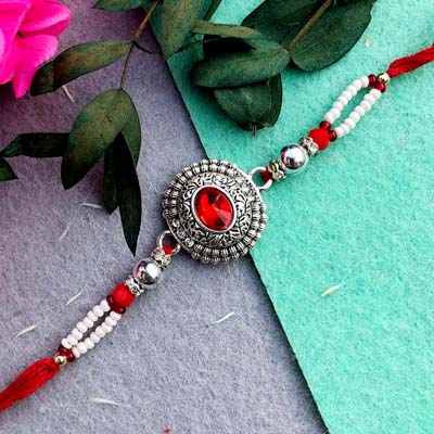 Red stone Based German silver thread Rakhi