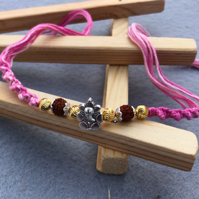 Handcrafted Ganesha Rudraksha Fancy Rakhi - Pink Thread Design