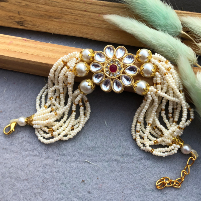 Grand Kundan Flower & Pearl Statement Bracelet Rakhi - A Majestic Raksha Bandhan Tribute!