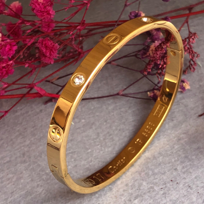 Elegant Gold-Plated Stainless Steel Bracelet Rakhi with Studded Crystals