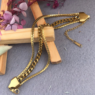 Dapper Gold-Toned Stainless Steel Bracelet Rakhi