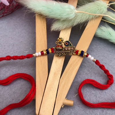 Divine Krishna Motif Thread Rakhi for Brother