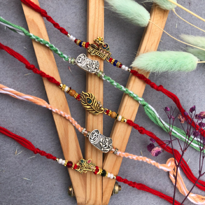 Vibrant Mixed Thread Rakhi Set for Brothers - Set of 5 Divine Designs