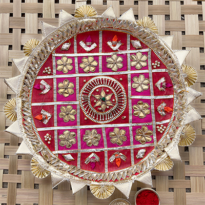 Lovely geometric pattern Rakhi Thali with floral design at center