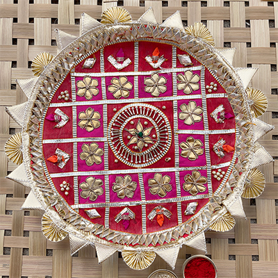 Lovely geometric pattern Rakhi Thali with floral design at center