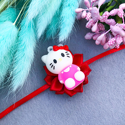 Red flower based kitten Rakhi for kids