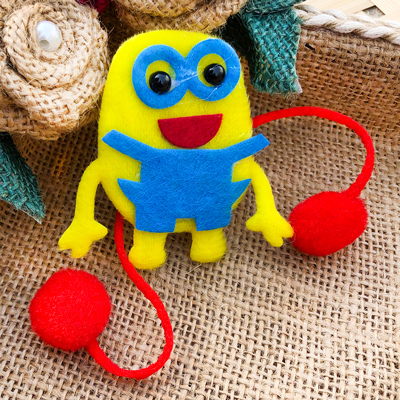 Artful yellow gracy Minion smile Rakhi for kids