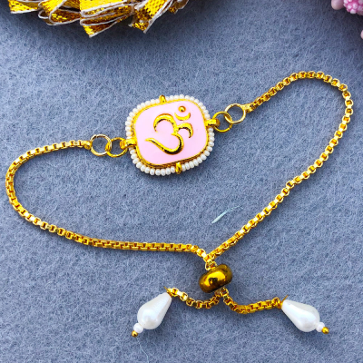 precious peach based Golden Om logo chain bracelet Rakhi