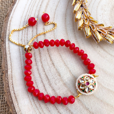 Classic red pearl kundan mina design bracelet Rakhi for bhabhi