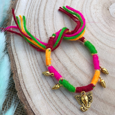 Auspicious Ganesh leaf Multicolor Rakhi