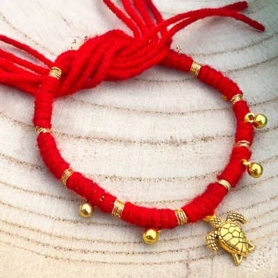 authentic Red Thread Rakhi with tortoise design