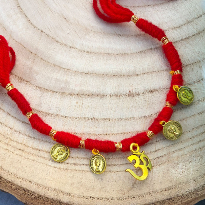 Golden Om with coin design thread Rakhi for bhaiya bhabhi