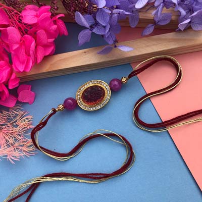 Designer Stone thread Rakhi for brother, sister