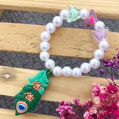 Mor Pankh pearl rakhi for girl