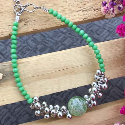 Simple green bracelet Rakhi for girls