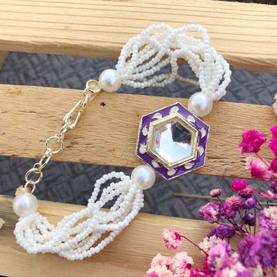 Jewellery design white cheed bracelet Rakhi for bhabhi