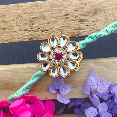 Beautiful flower design Kundan Rakhi