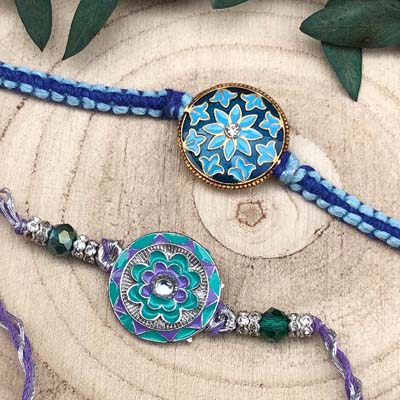 Sky blue Kundan and pearl rakhi combo of 2 for everyone