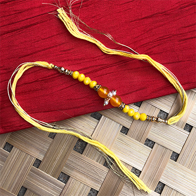 Rakhi special Yellow, orange pearl bhaiya bhabhi dora Rakhi