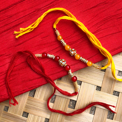 Golden look yellow,red pearl dora Rakhi combo for bhaiya bhabhi