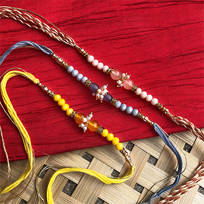 Auspicious color Dora Rakhi set of 3 for bhaiya bhabhi