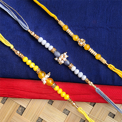 Demanded pearl, beads dora Rakhi combo fir bhaiya n bhabhi