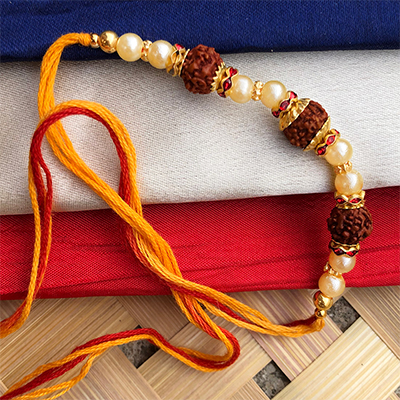 Dora Rakhi with amazing pearls and 3 auspicious Rudraksha