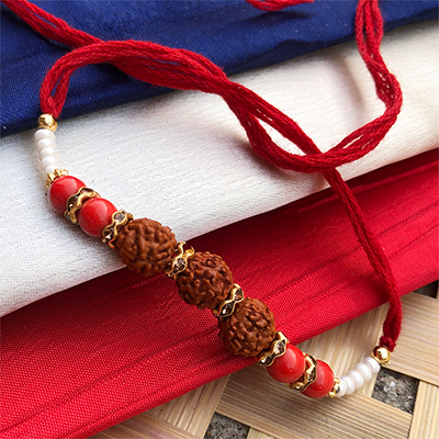 bhaiya bhabhi dora Rakhi with precious Rudraksha & red pearls 