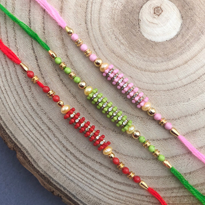 woolen thread pink, green, Red Dora Rakhi combo of 3