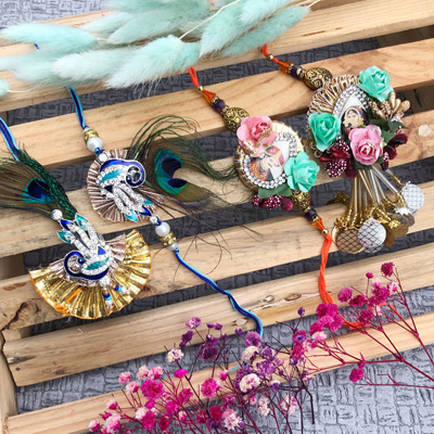 Majestic Peacock and Floral Bhaiya-Bhabhi Rakhi Combo of 2 pair