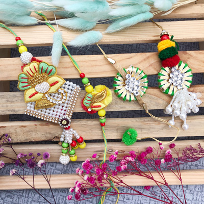 Vibrant Floral and Beaded Bhaiya-Bhabhi Rakhi Set of 2 pair