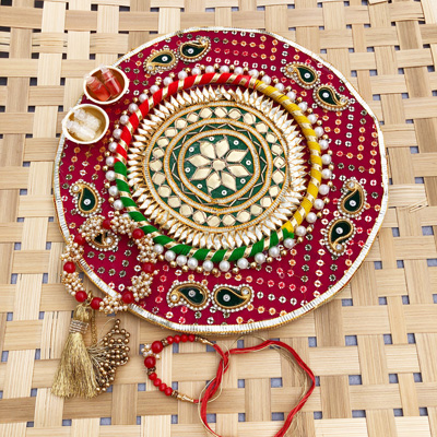 Chundri design puja thali with bhaiya bhabhi bracelet n Dora Rakhi combo
