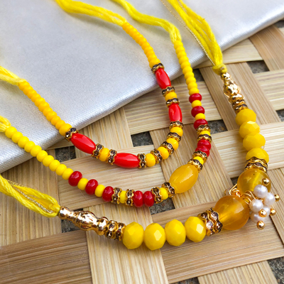 Beautiful Precious yellow  pearl, beads bhaiya, bhabhi Rakhi set of 3