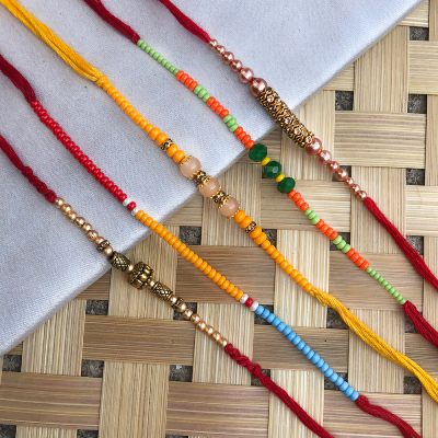 Precious colorful pearl, beads bhaiya, bhabhi Rakhi set of 5