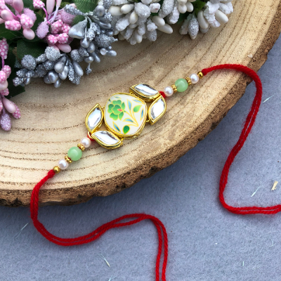 Flower printed kundan Rakhi for brother