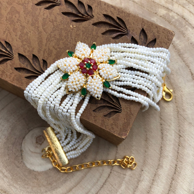 authentic white flower design bracelet Rakhi for bhabhi, sister