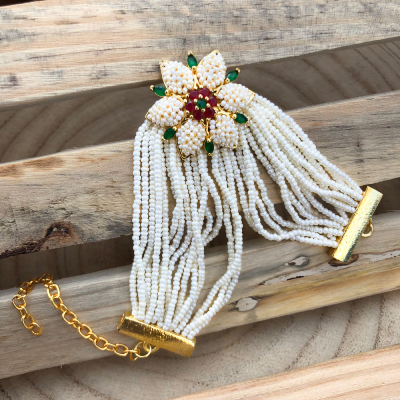 authentic white flower design bracelet Rakhi for bhabhi, sister
