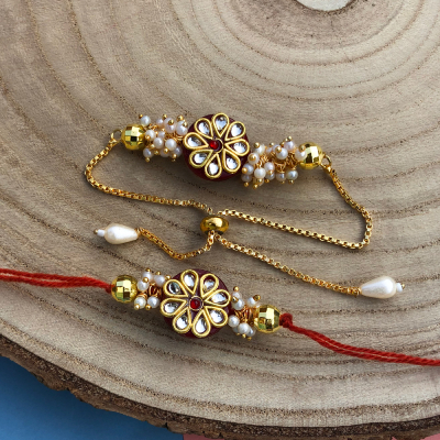 auspicious kundan flower design chain bracelet and Dora Rakhi combo for bhaiya and bhabhi