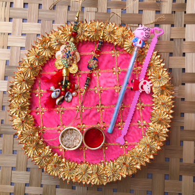 pretty Pink puja thali with bhaiya bhabhi kids rakhi with pencile combo