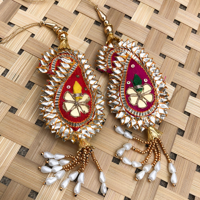 Beautiful Set of 2 - Traditional pippala leaf design Lumba Rakhi for bhabhi