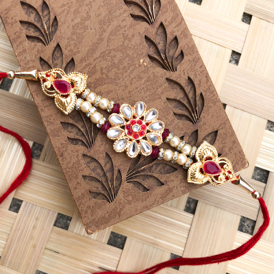 Exquisite Gold Plated Designer Floral Rakhi set