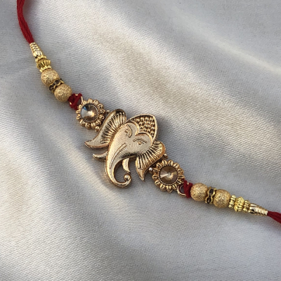 Magnificient Ganesh Beads Rakhi for Brother
