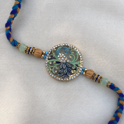 Divinity Pearl Designer Peacock Rakhi