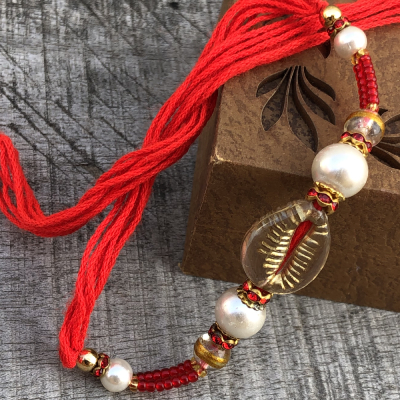 Memorable Glass & Gold Rakhi for Bhaiya