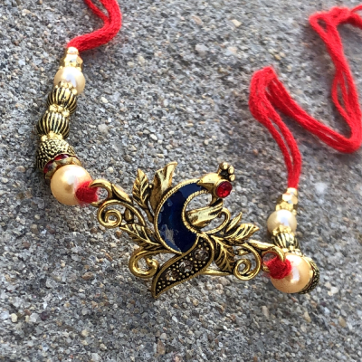 Amazing Flower & Golden Peacock Rakhi